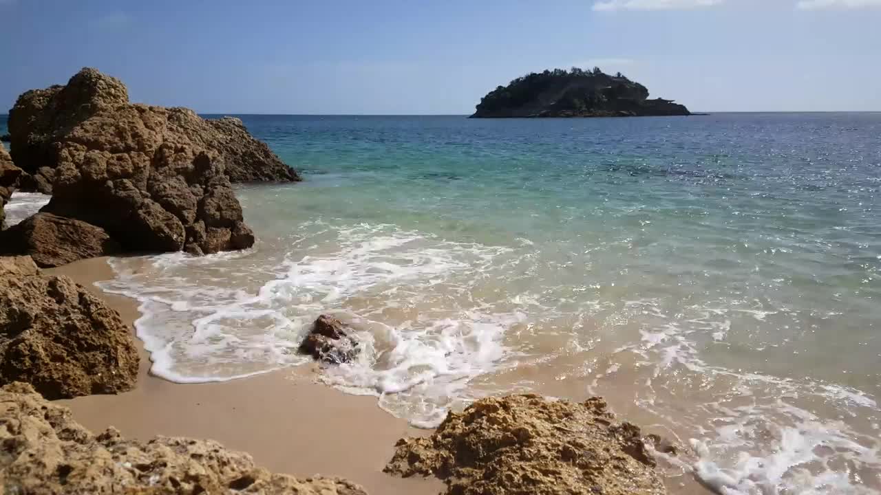 Stock Video Beach With Rocks And An Island In The Background Live Wallpaper For PC