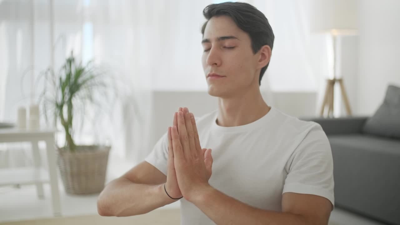 Video Stock Closeup Of Man In Namaste Yoga Pose In Living Room Live Wallpaper For PC