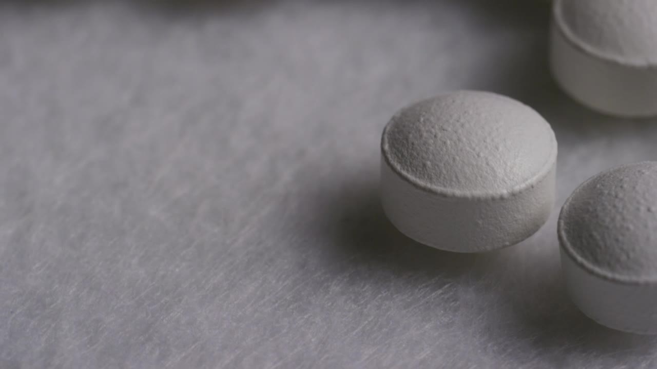 Video Stock Close Up Of White Pills Rotating Live Wallpaper For PC