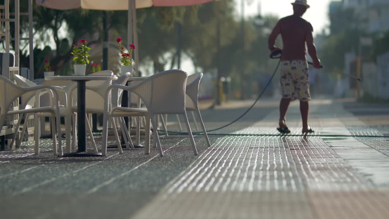 Video Stock Cleaning The Street Outside A Cafe Live Wallpaper For PC