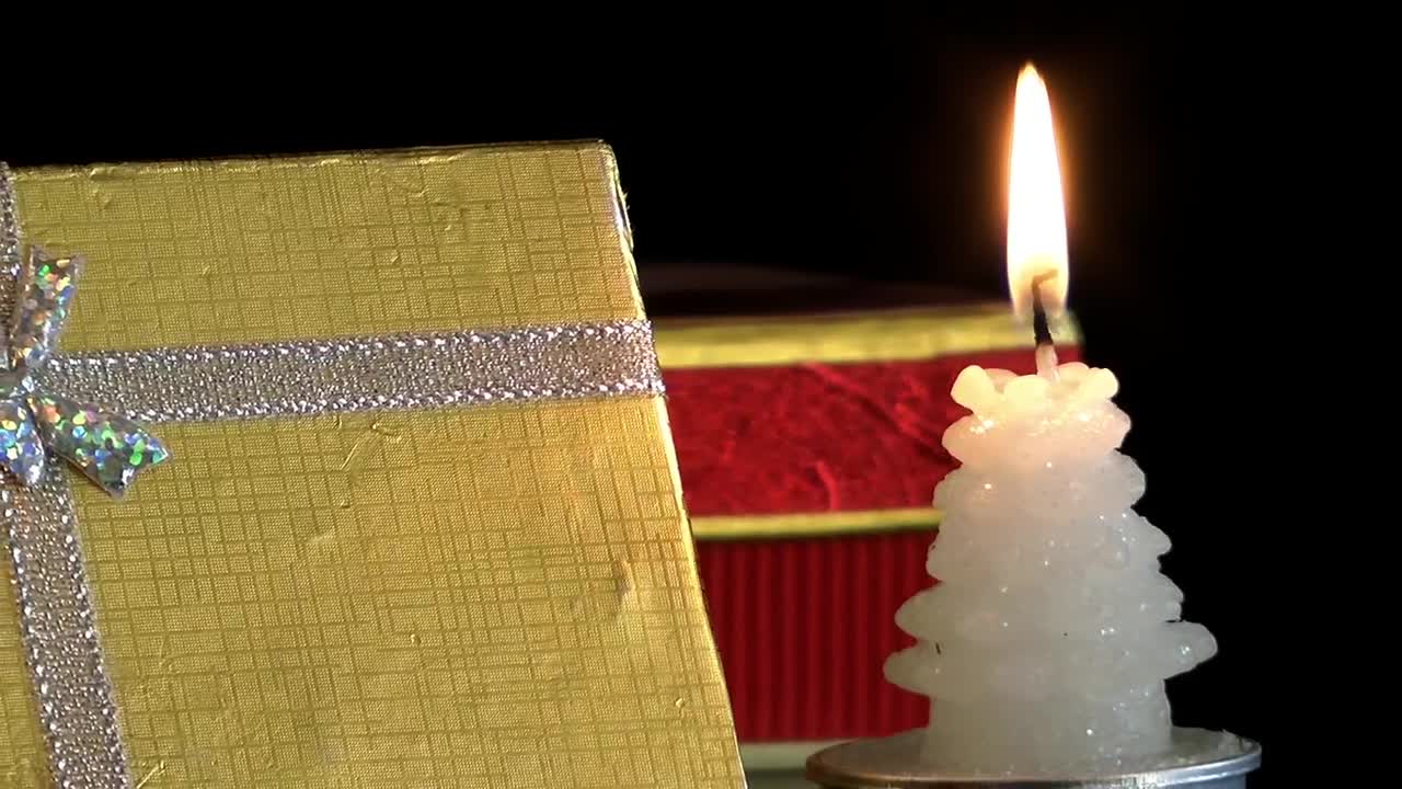 Video Stock Christmas Gift Box And A Candle Live Wallpaper For PC