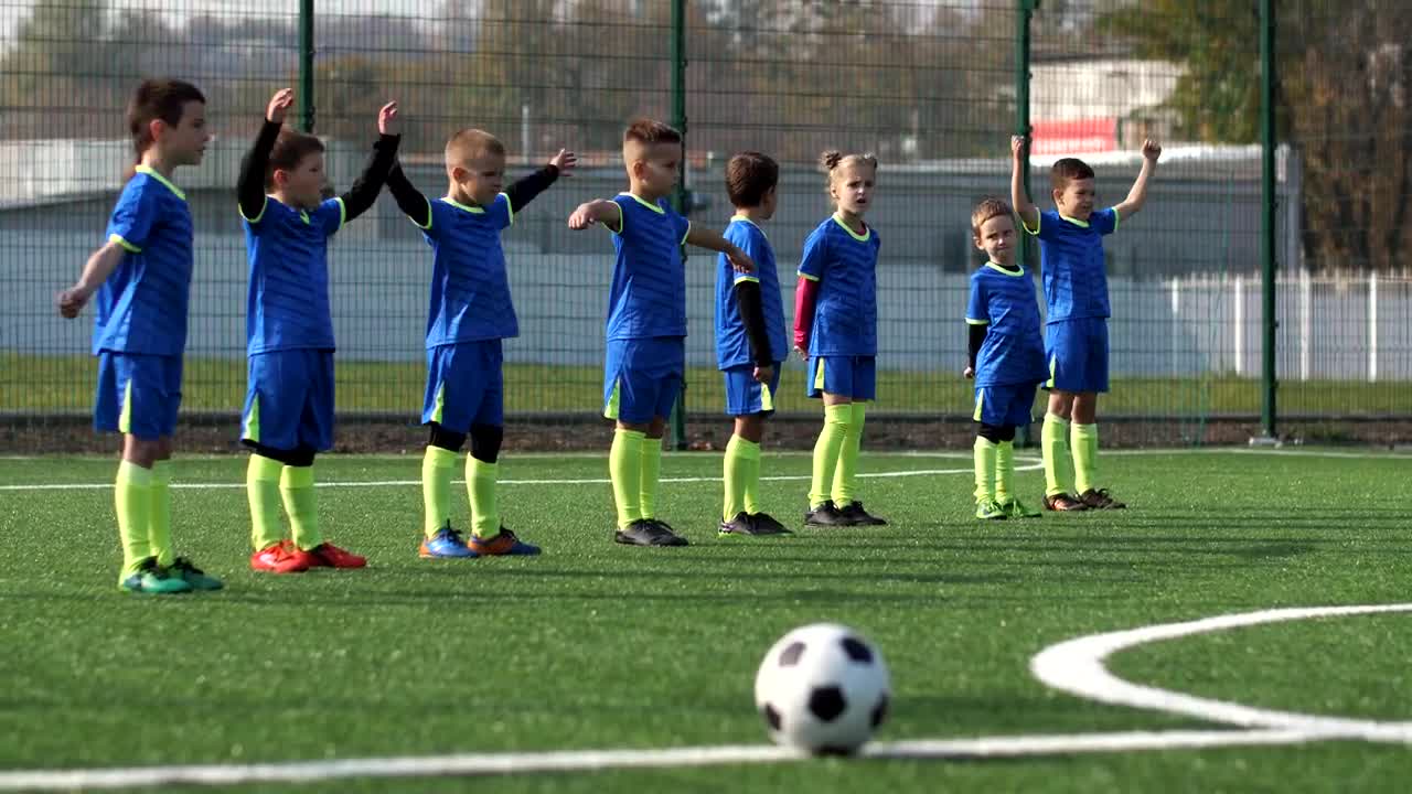Video Stock Childrens Soccer Team Warming Up On A Pitch Live Wallpaper For PC