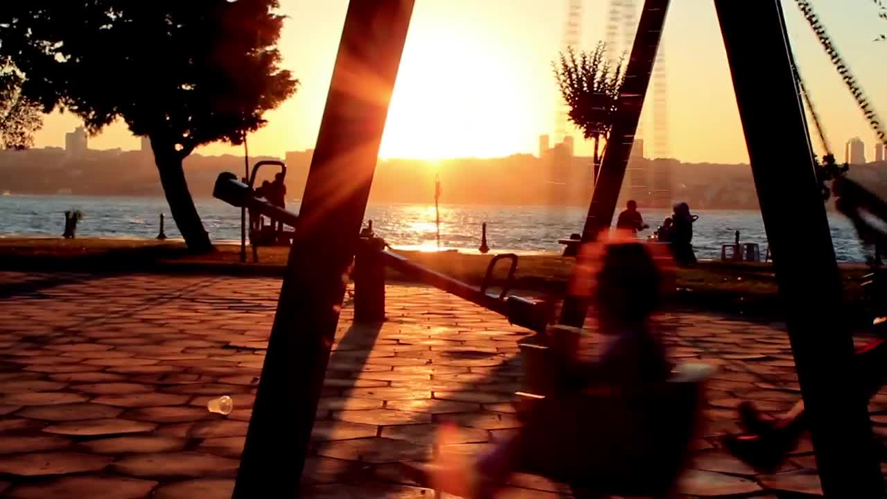 Video Stock Children Swinging In A Park Near The Coast Live Wallpaper For PC