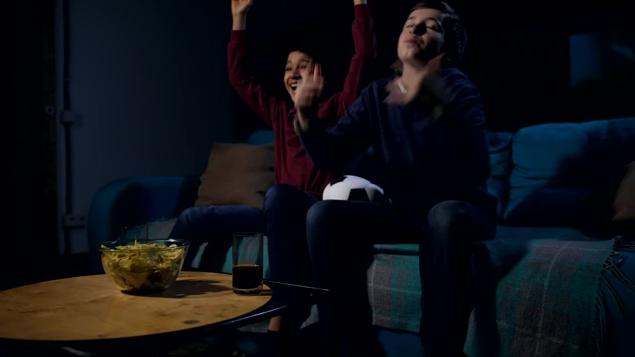 Video Stock Children On A Sofa With Snacks Watching A Movie Live Wallpaper For PC