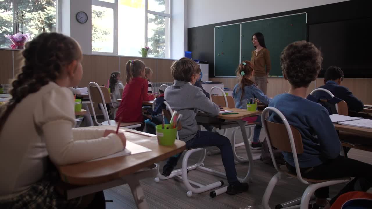 Video Stock Children In A Classroom Raising Their Hands Live Wallpaper For PC