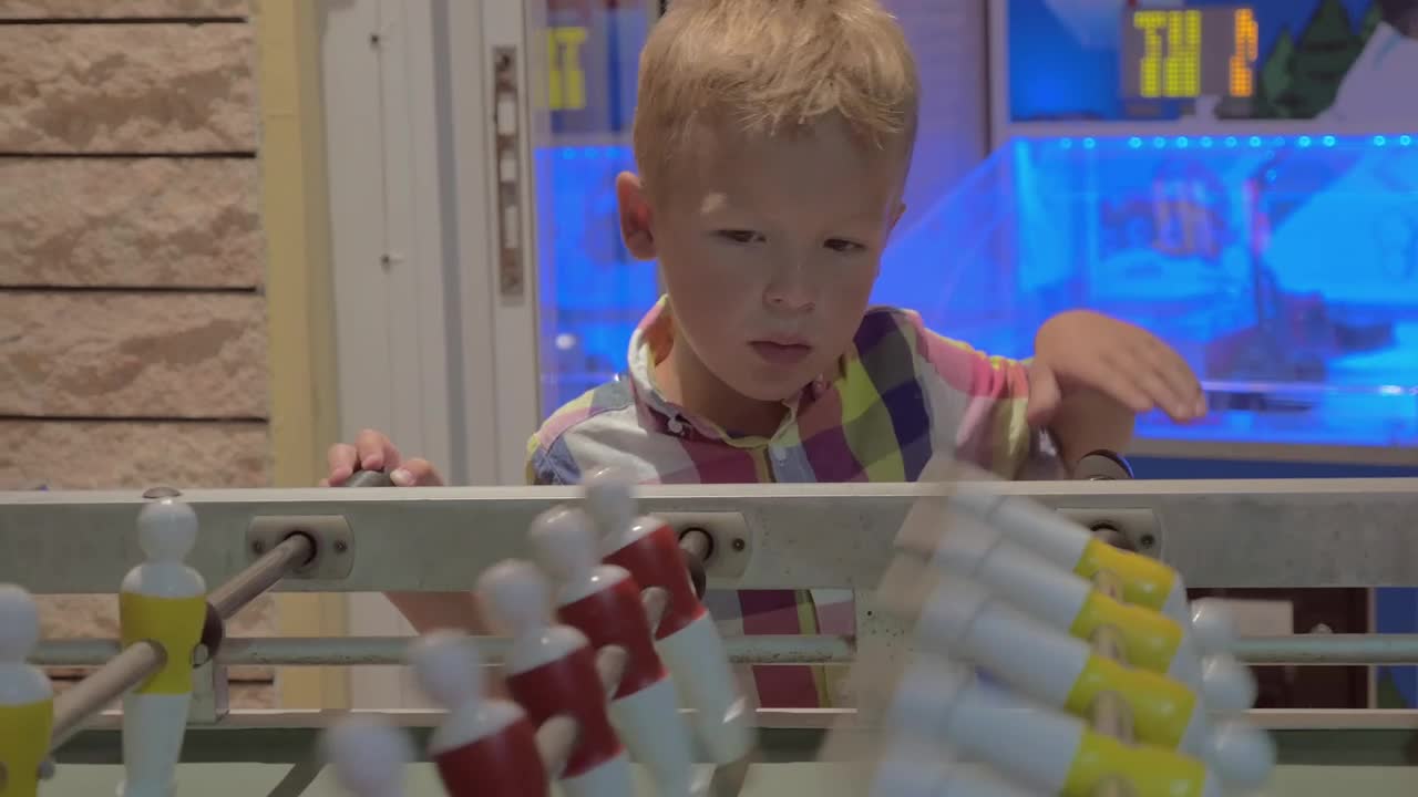 Video Stock Child Watching A Game Of Table Football Live Wallpaper For PC