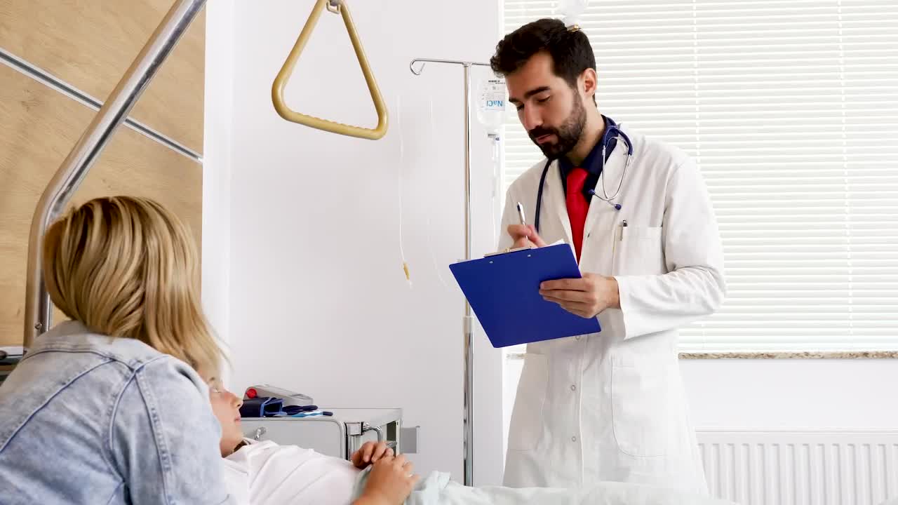 Video Stock Child In Hospital Smiles At Doctor Holding Clipboard Live Wallpaper For PC