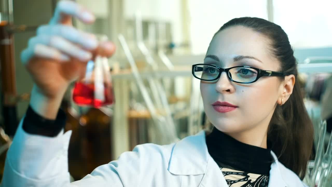 Video Stock Chemistry Shaking A Conical Flask With Red Liquid Live Wallpaper For PC