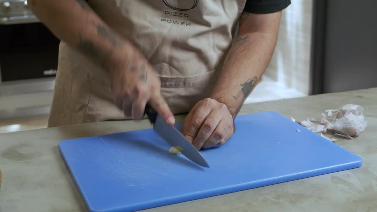Video Stock Chef Skillfully Mincing A Garlic Live Wallpaper For PC