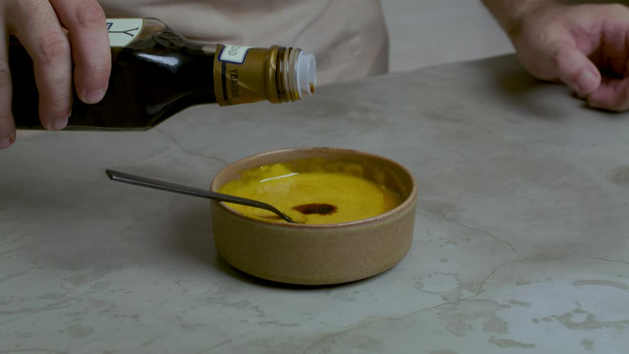 Video Stock Chef Preparing A Mixture In A Small Container Live Wallpaper For PC