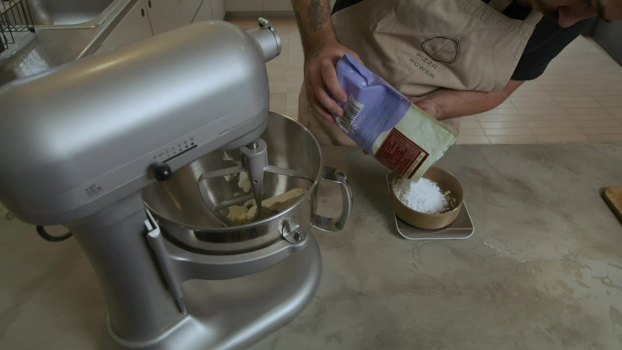 Video Stock Chef Adding Ingredients To An Electric Mixer Live Wallpaper For PC