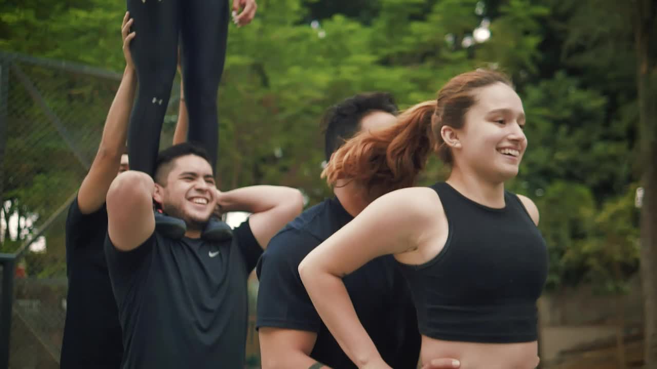 Video Stock Cheerleader Man Lifting A Girl With His Hands Live Wallpaper For PC