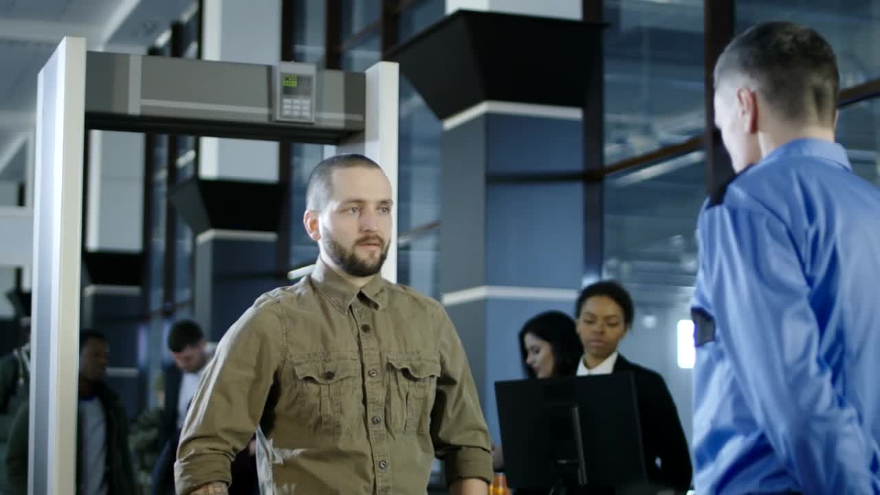 Video Stock Checking Passenger With Metal Detector At Airport Live Wallpaper For PC