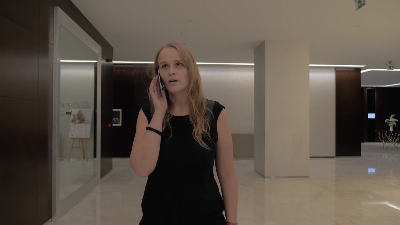 Video Stock Chatting On A Phone In A Hotel Lobby Live Wallpaper For PC