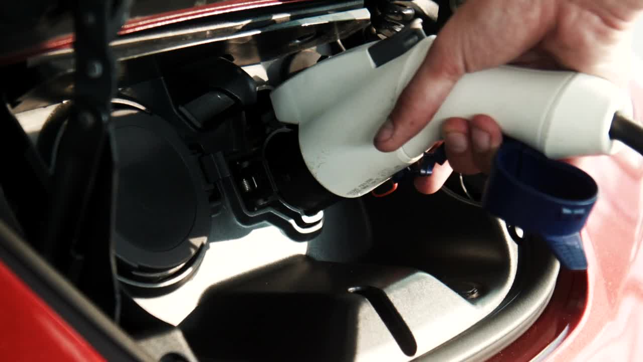 Video Stock Charging An Electric Car Close Up Live Wallpaper For PC