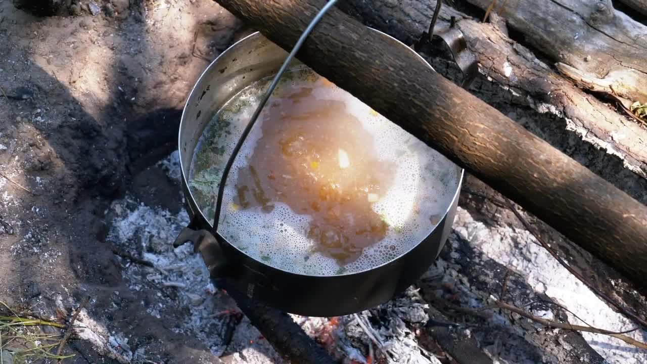 Video Stock Casserole With Boiling Water On A Campfire Live Wallpaper For PC