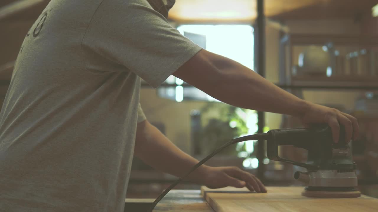 Video Stock Carpenter Sanding A Piece Of Lumber Live Wallpaper For PC