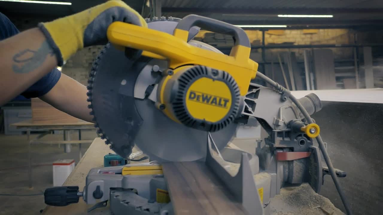 Video Stock Carpenter Operating An Electric Saw In A Workshop Live Wallpaper For PC