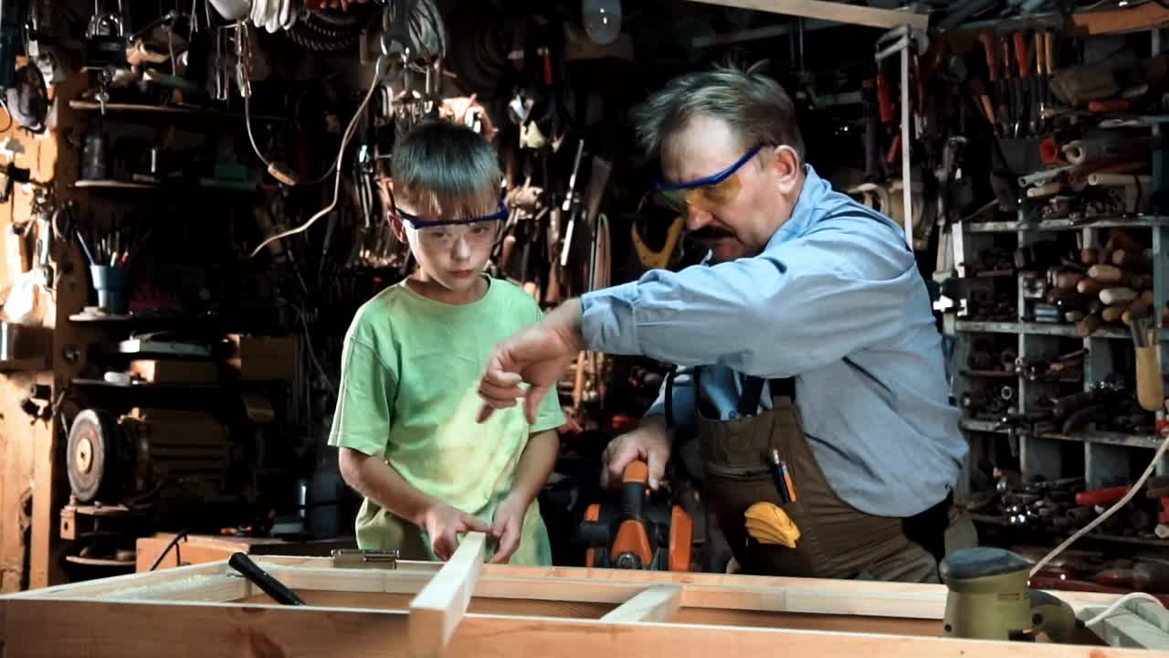Video Stock Carpenter And Grandson In The Workshop Live Wallpaper For PC