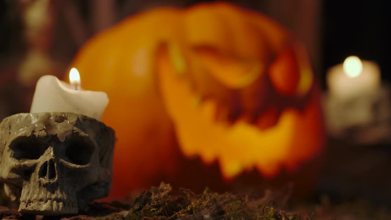 Video Stock Candles On The Sides Of A Lighted Halloween Pumpkin Live Wallpaper For PC