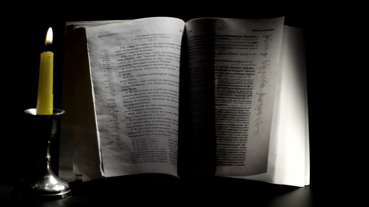 Video Stock Candle Burning Next To A Bible Live Wallpaper For PC