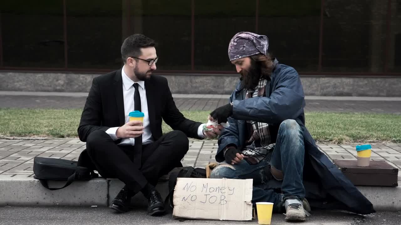 Video Stock Businessman With Homeless On The Street Live Wallpaper For PC