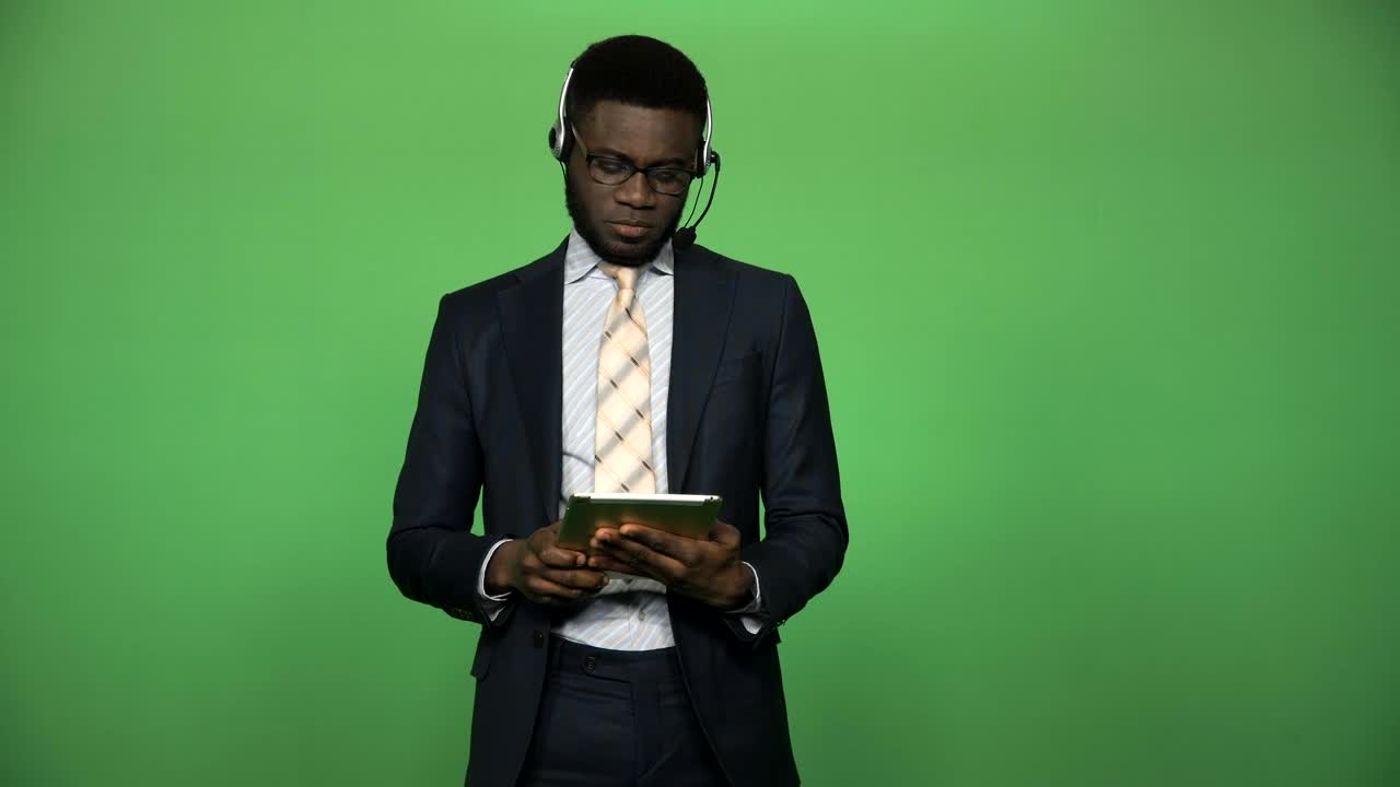 Video Stock Businessman With Headset And Tablet Live Wallpaper For PC