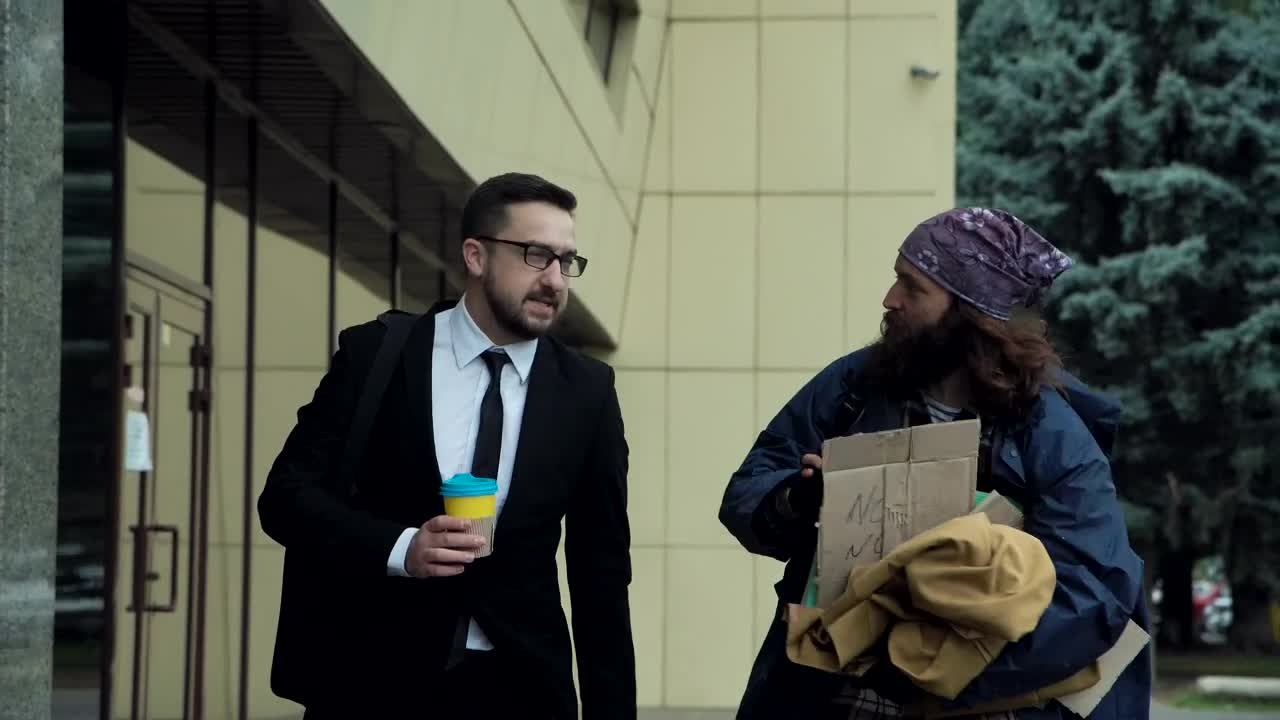 Video Stock Businessman Walking With A Beggar In The Street Live Wallpaper For PC