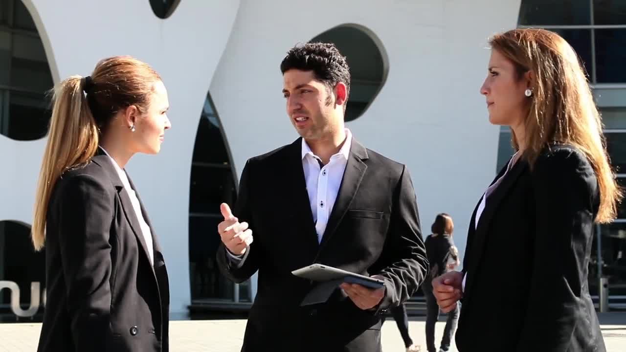 Video Stock Businessman Talking To Two Businesswomen Live Wallpaper For PC
