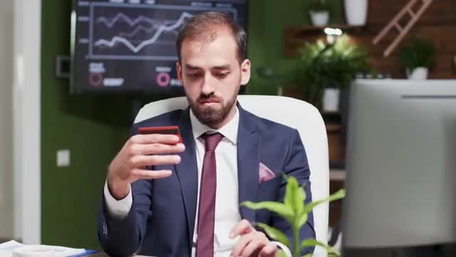 Video Stock Businessman Online Shopping In Office Holds Credit Card Smal Live Wallpaper For PC