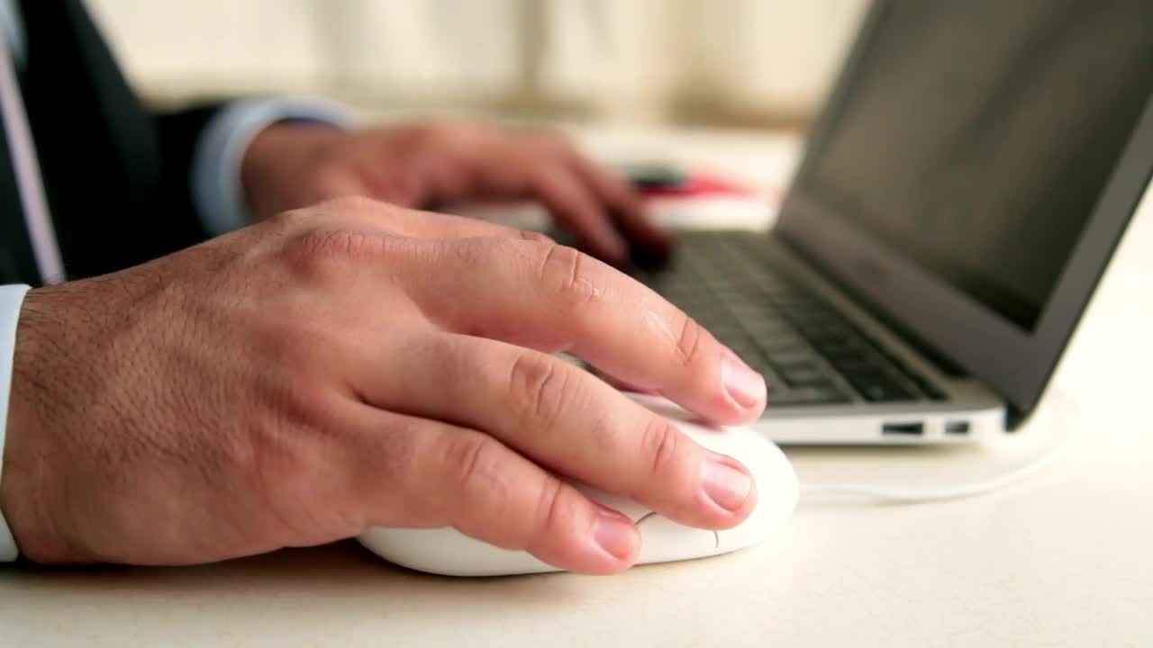 Video Stock Businessman In Suit Working On A Macbook Live Wallpaper For PC