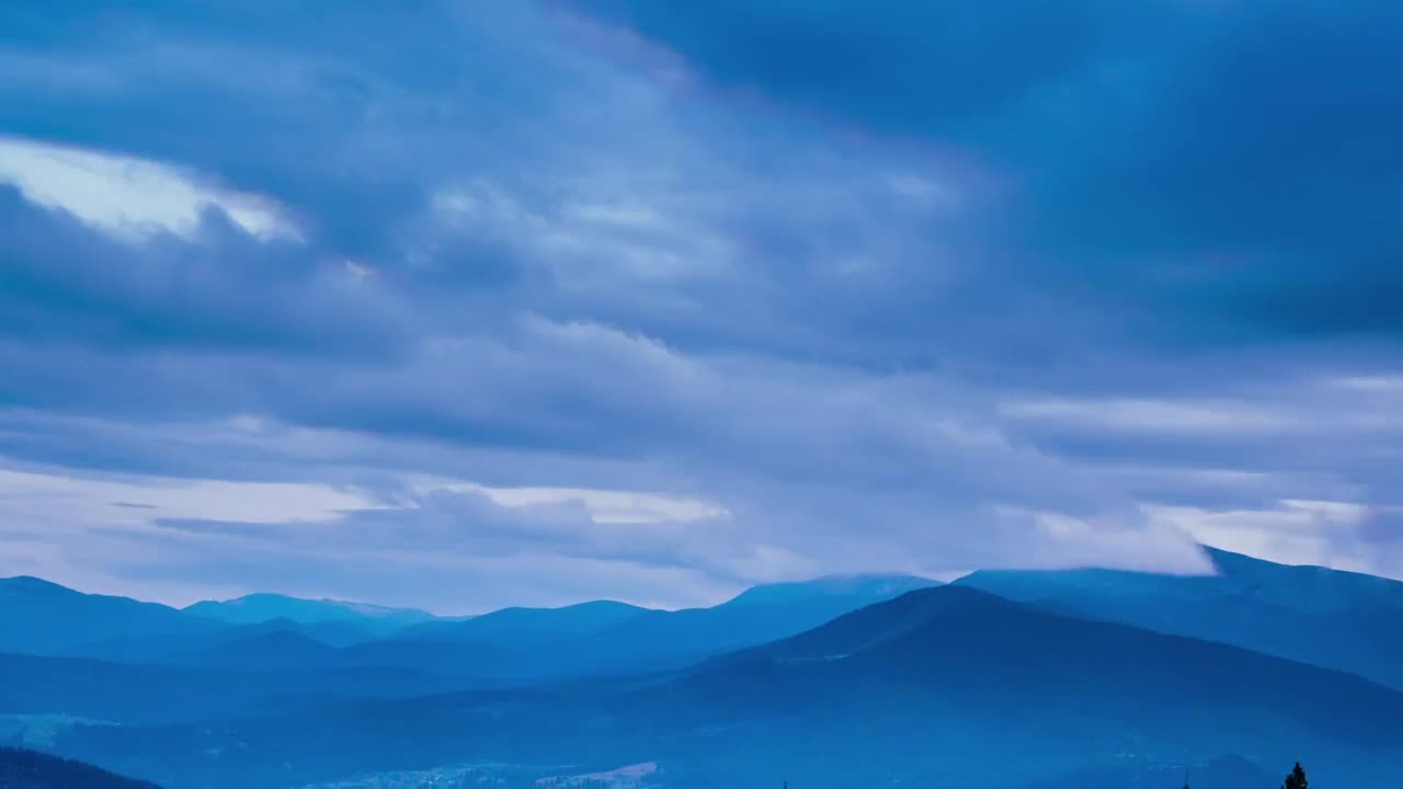 Video Stock Clouds Covering A Landscape In Blue Tones Live Wallpaper For PC