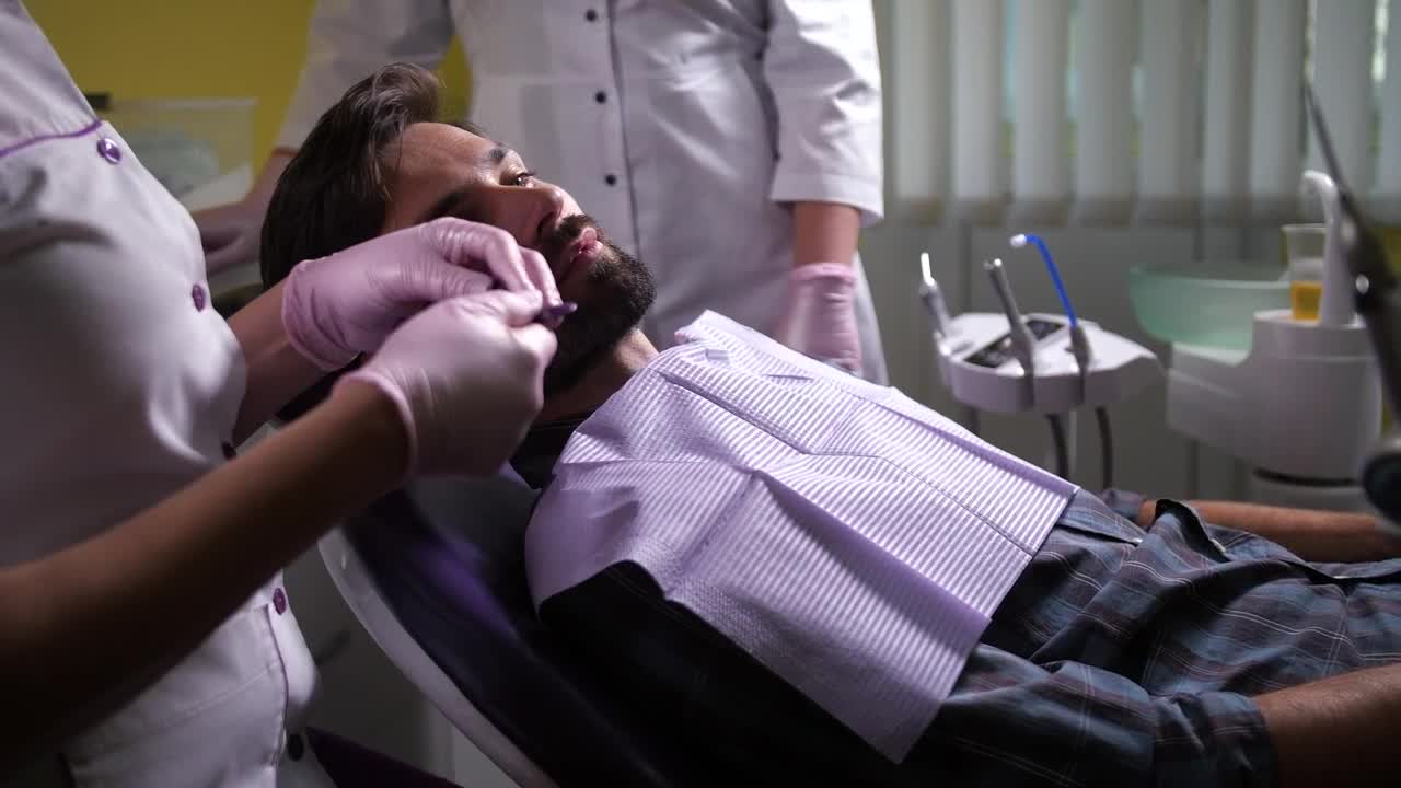 Stock Video Dentist Working With A Male Patient Live Wallpaper For PC