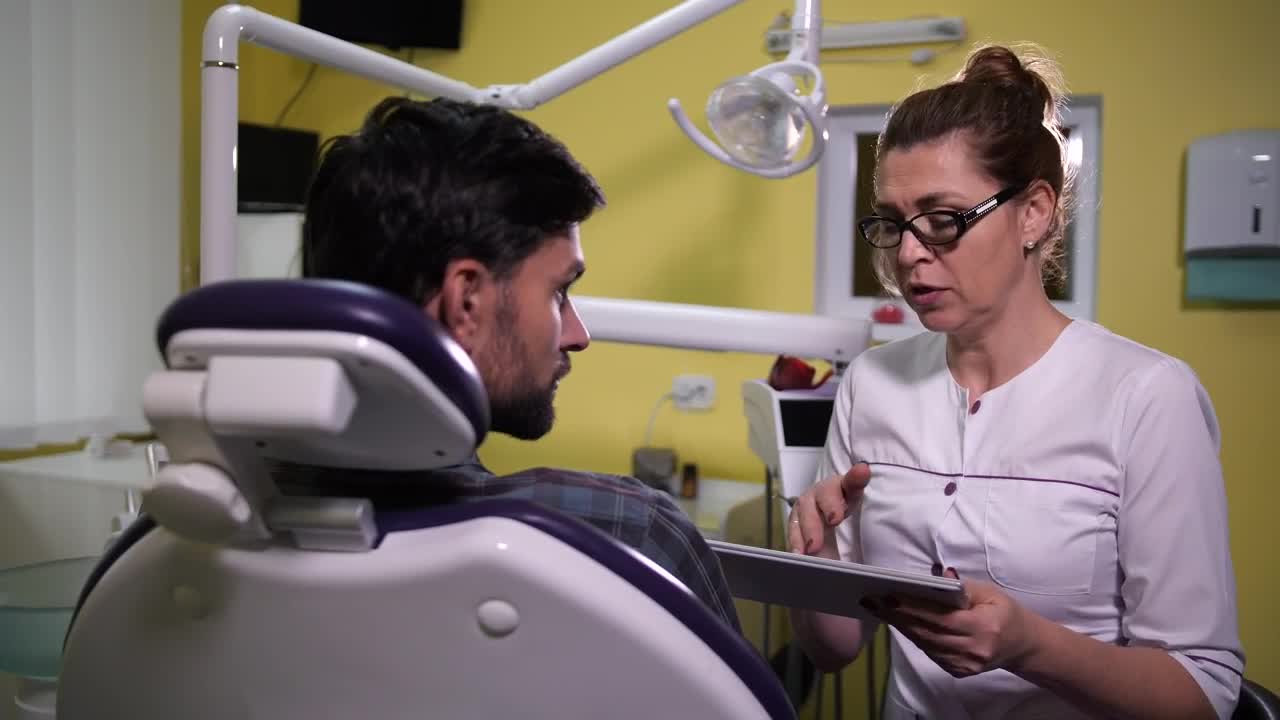 Stock Video Dentist Using A Tablet While Speaking Live Wallpaper For PC