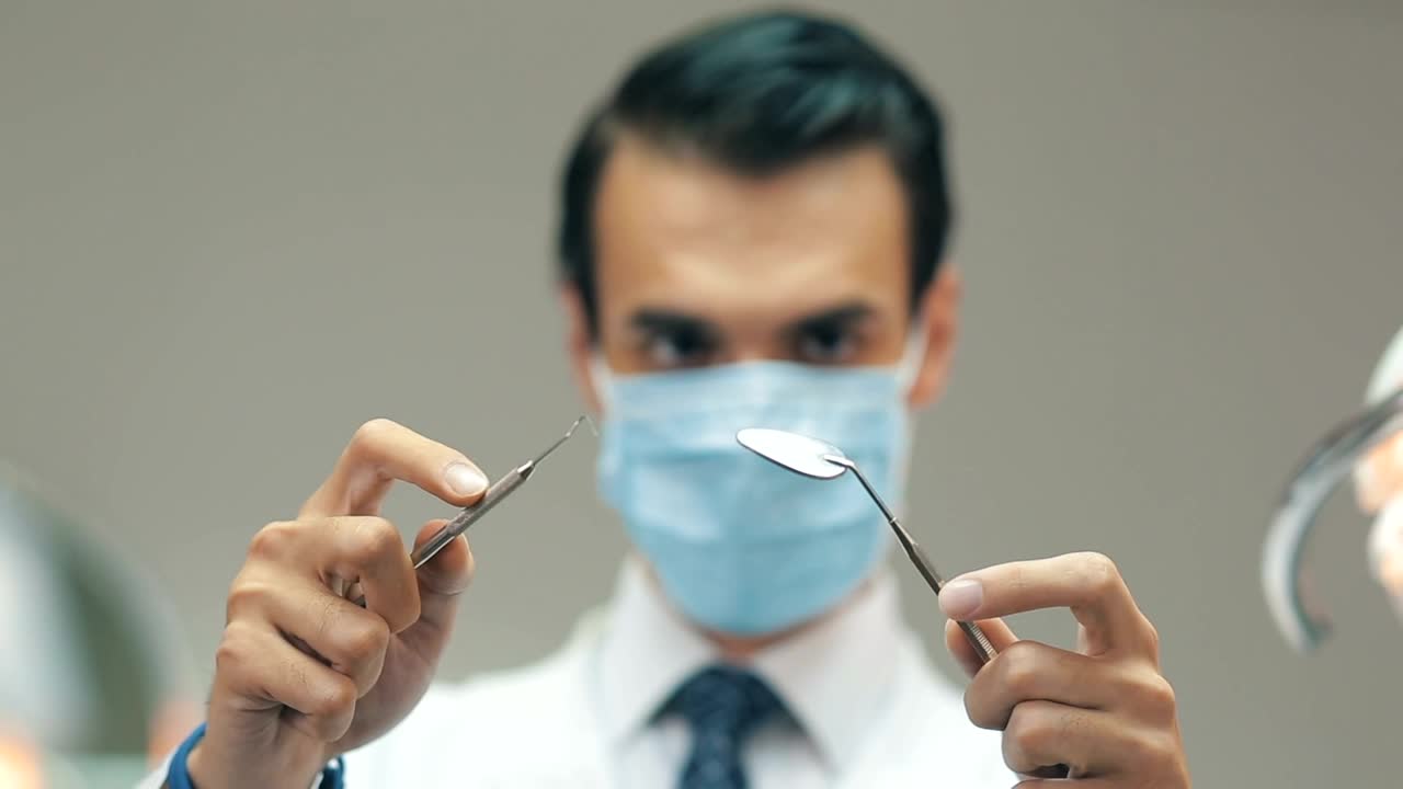 Stock Video Dentist Holding Tools Live Wallpaper For PC