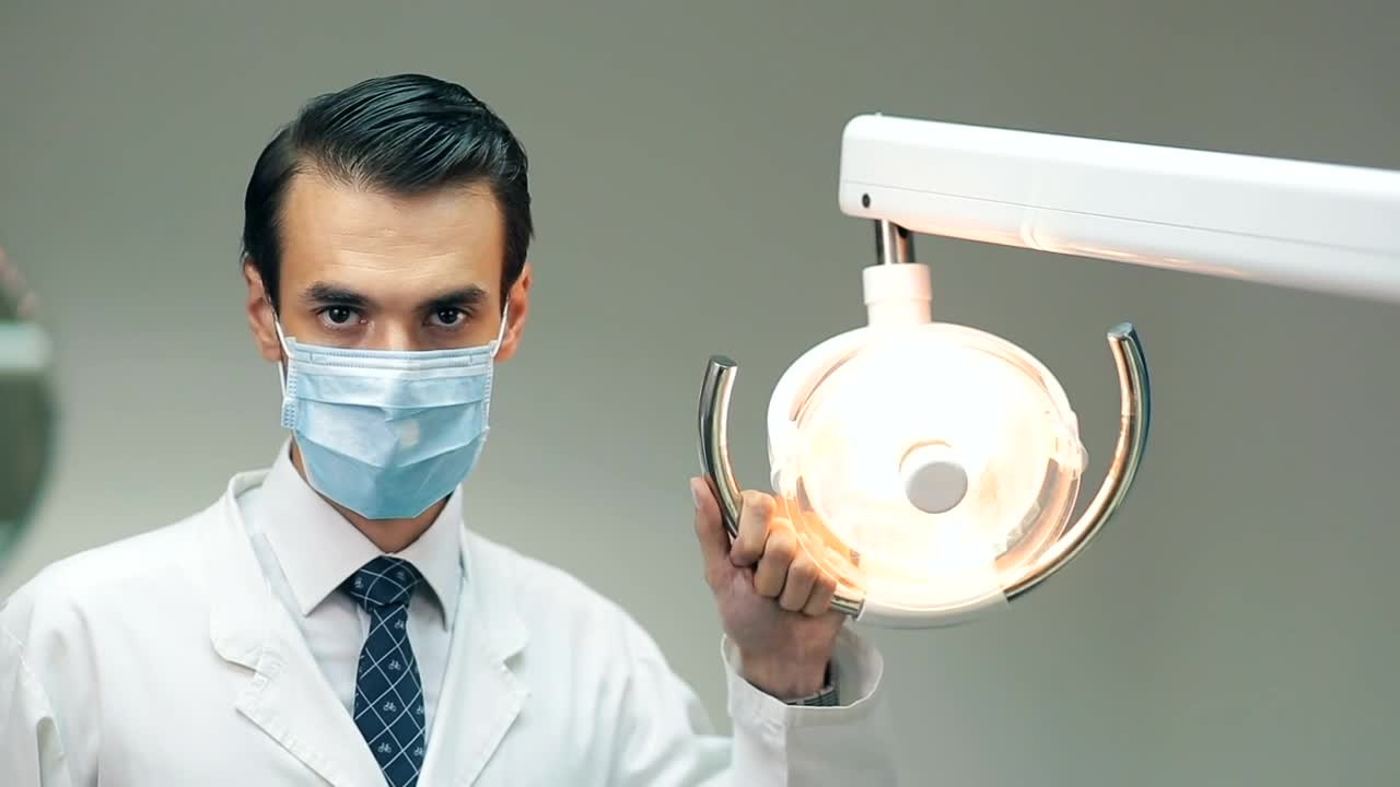 Stock Video Dentist Holding A Lamp In His Office Live Wallpaper For PC