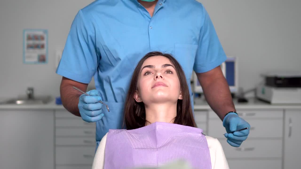 Stock Video Dentist Examines Womans Teeth Live Wallpaper For PC