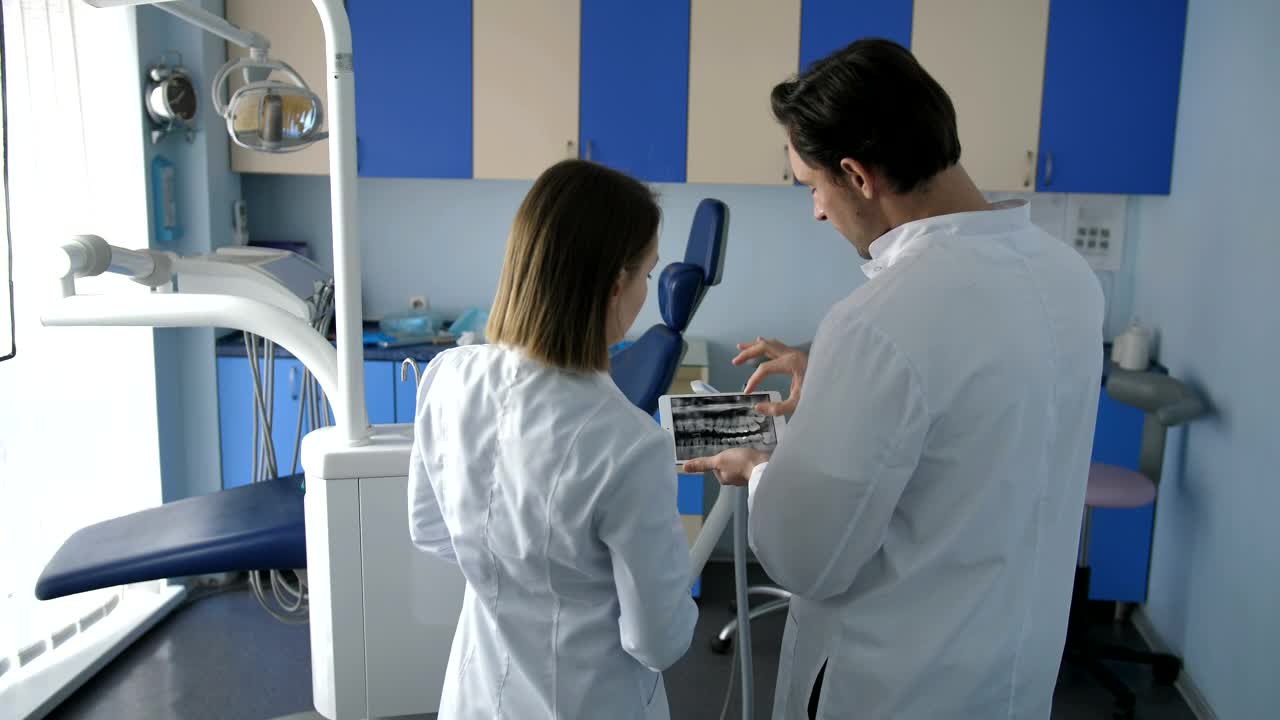 Stock Video Dental Staff Using A Tablet Computer Live Wallpaper For PC