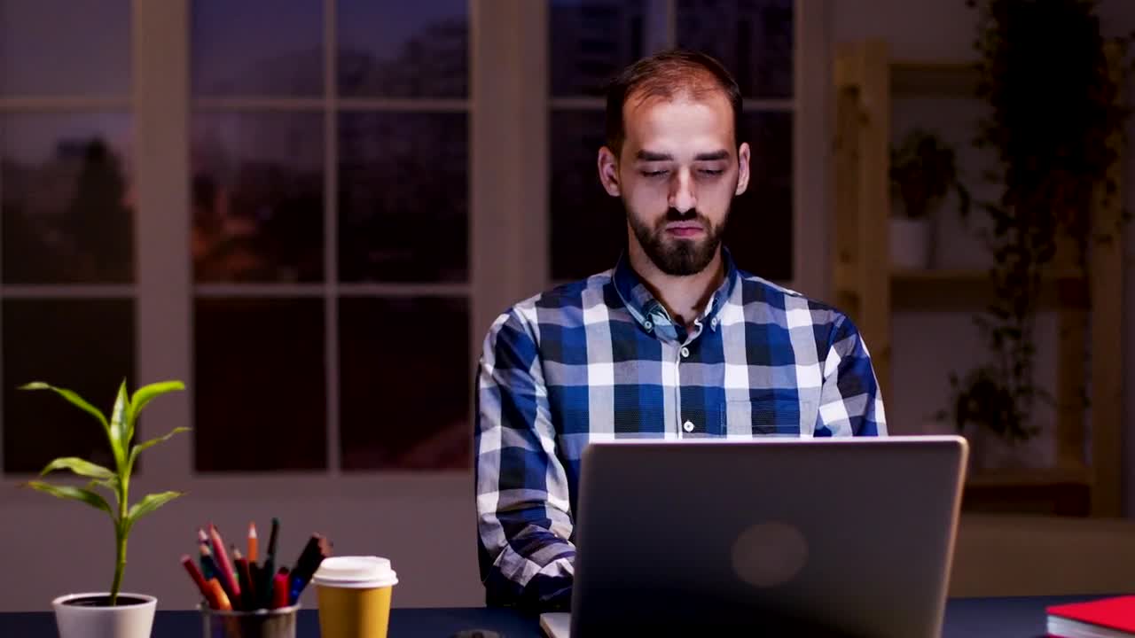 Stock Video Deep Thinking Man Working On Laptop From Home Live Wallpaper For PC