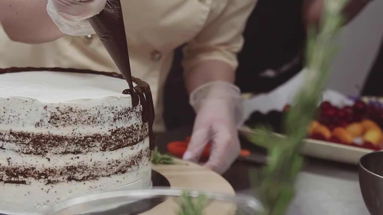 Stock Video Decorating A Cake With Chocolate Live Wallpaper For PC