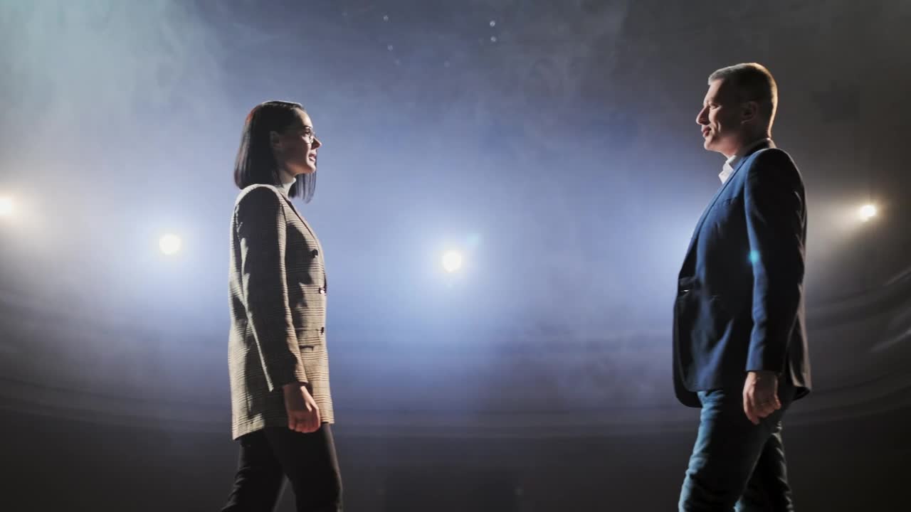 Stock Video Debate Speakers Shake Hands On Stage At Conference Live Wallpaper For PC