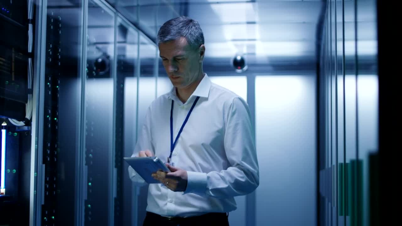 Stock Video Datacenter Engineer With A Tablet Live Wallpaper For PC