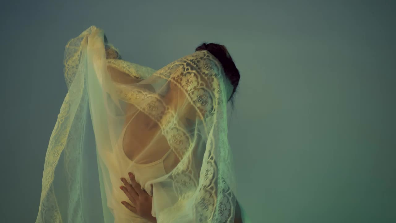 Stock Video Dancer Moving With Her Body Under A Veil Live Wallpaper For PC