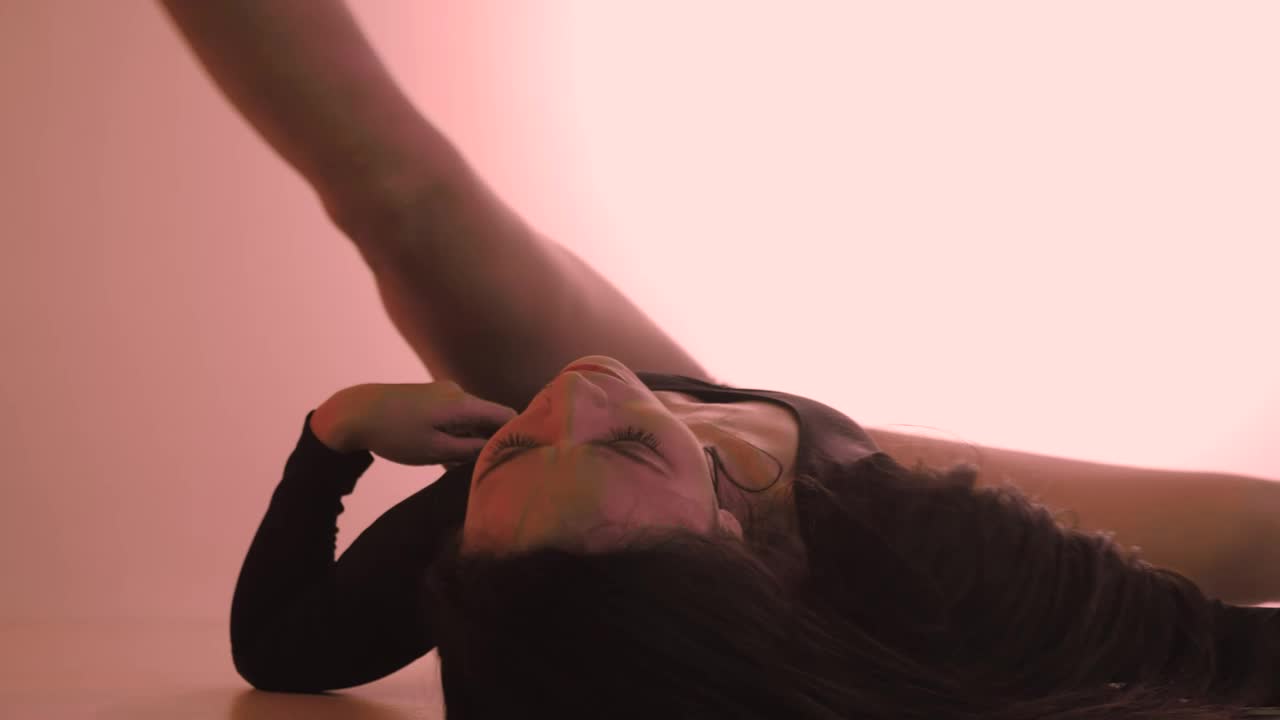 Stock Video Dancer Moving Her Body Lying On The Floor Live Wallpaper For PC
