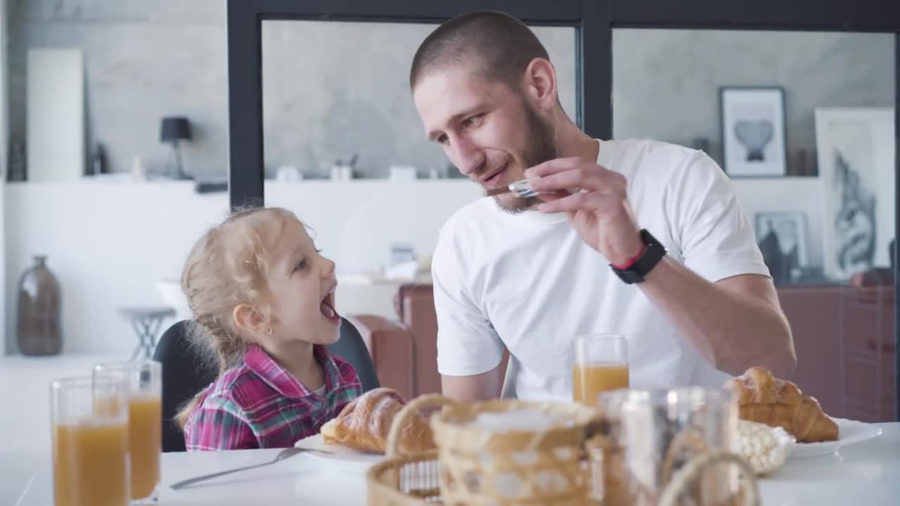 Stock Video Dad Plays Spoon Airplane With Little Girl Live Wallpaper For PC