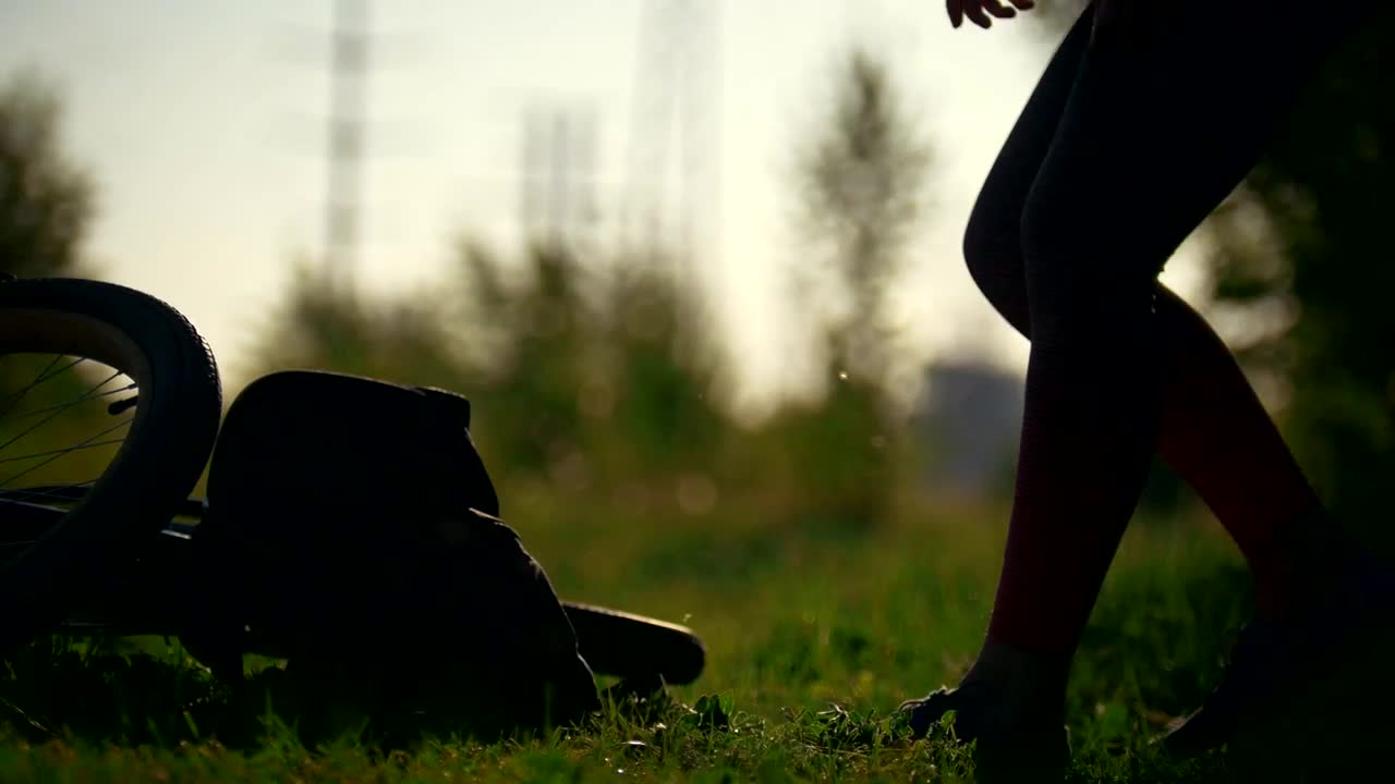 Stock Video Cyclist Woman Pulls Out Of The Backpack A Water Bottle Live Wallpaper For PC