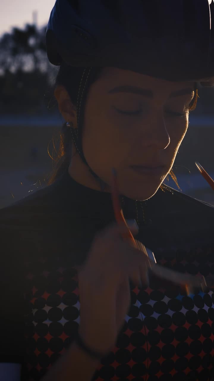 Stock Video Cyclist Girl Puts On Sunglasses To Train On A Track Live Wallpaper For PC