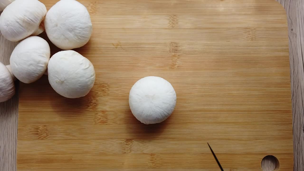 Stock Video Cutting Up Mushrooms For Dinner Live Wallpaper For PC