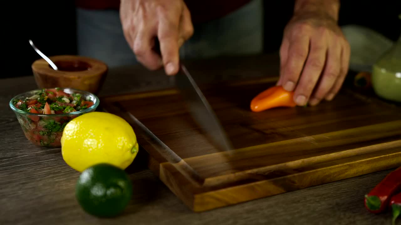 Stock Video Cutting Up An Orange Pepper Live Wallpaper For PC