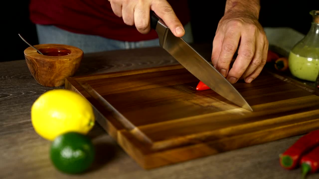 Stock Video Cutting Up A Chilli On A Board Live Wallpaper For PC